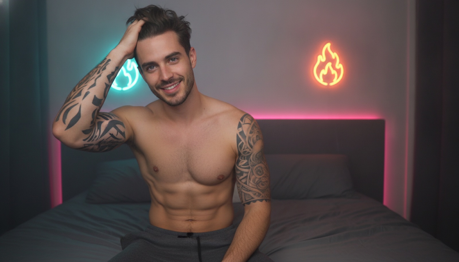 A shirtless, tattooed male cam model smirking at his webcam from his bed under cyan and pink neon